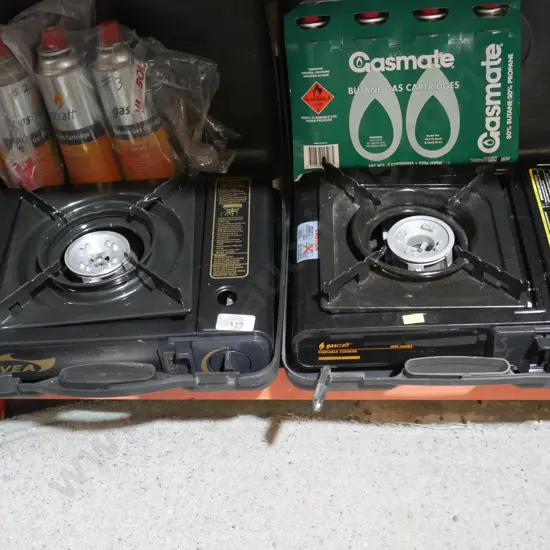 Two portable cookers and butane gas cartridges