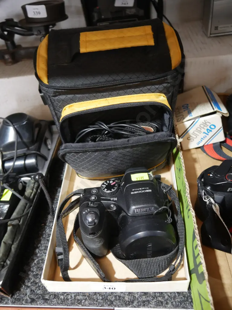 Fujifilm camera and bag Image 1++