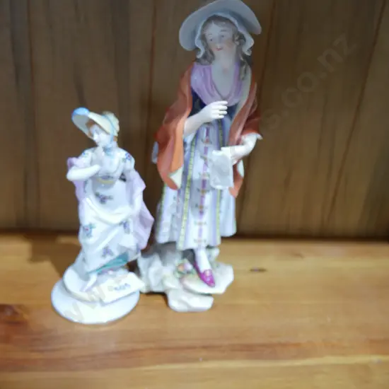Two lady figurines