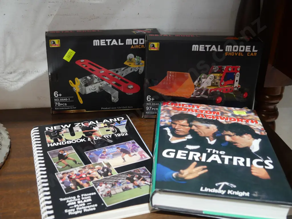 Metal model plane and shovel car, All Blacks books Image 1++