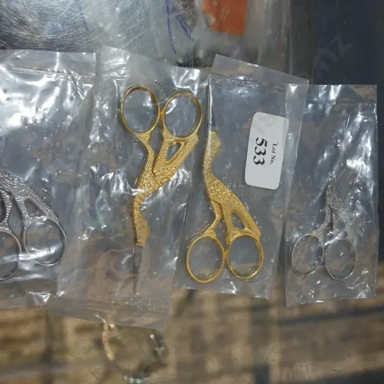 4 pair of stork scissors