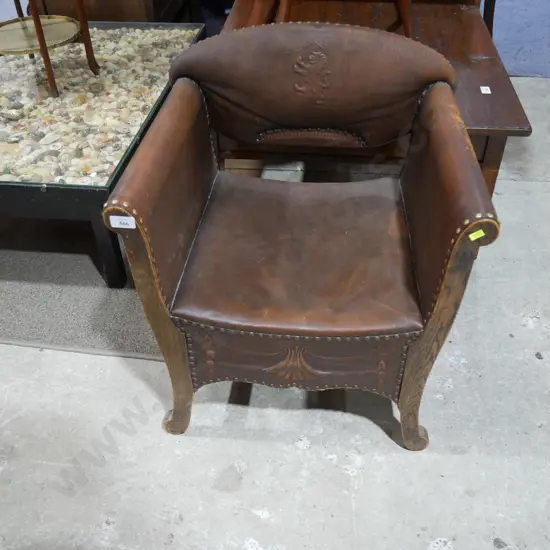 Oak and leather armchair