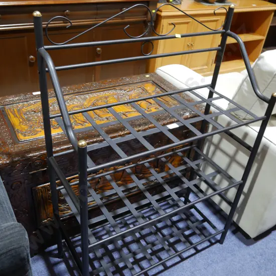 Black metal shoe rack