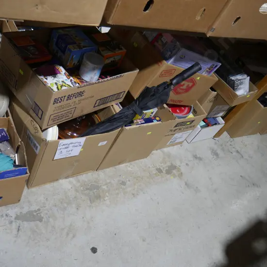 Many boxes of jigsaw puzzles, kitchenware, sundries