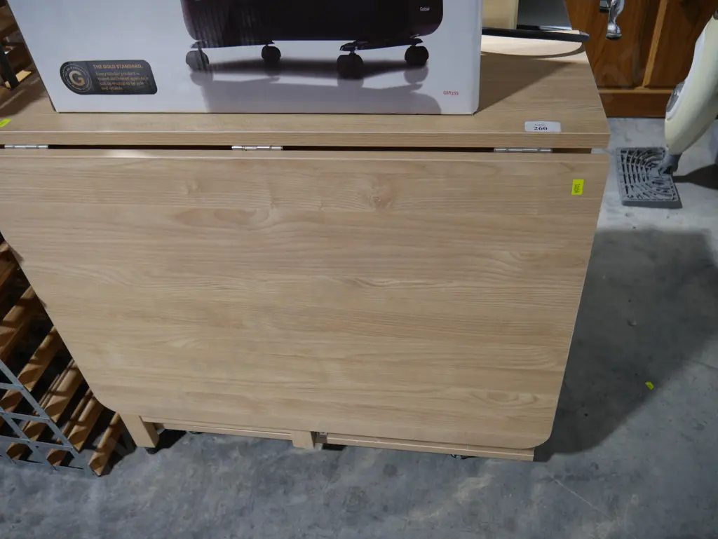 Dropside dining table with storage Image 1++