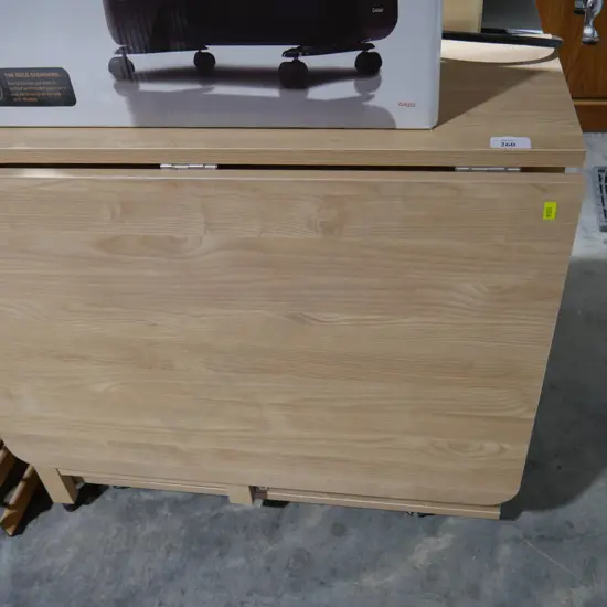 Dropside dining table with storage