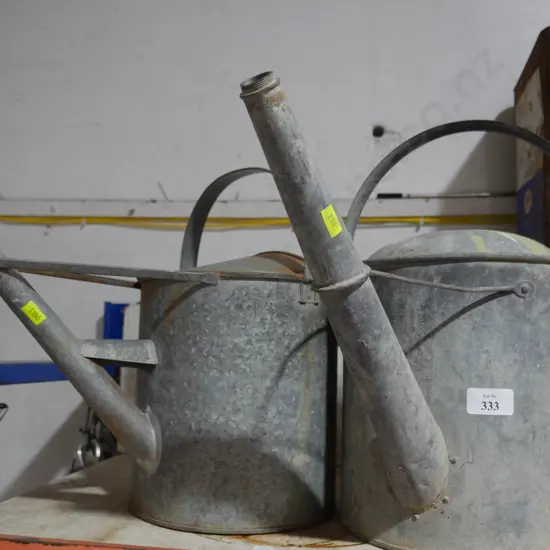 Two watering cans
