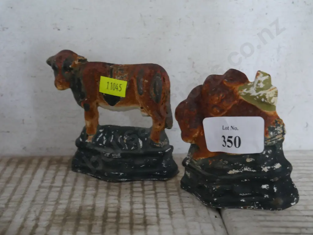 2 cast door stops Image 1++