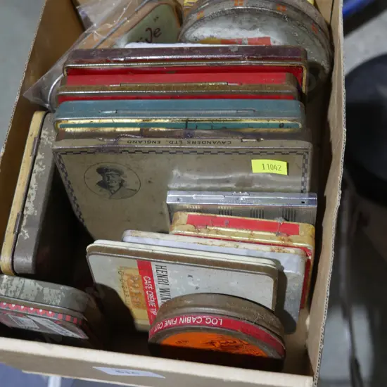 Assorted tobacco tins
