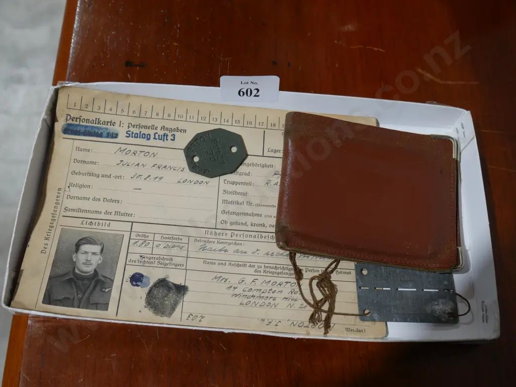Prisoner of war registration, dog tag etc - J.F.L Morton 1943 Image 1++