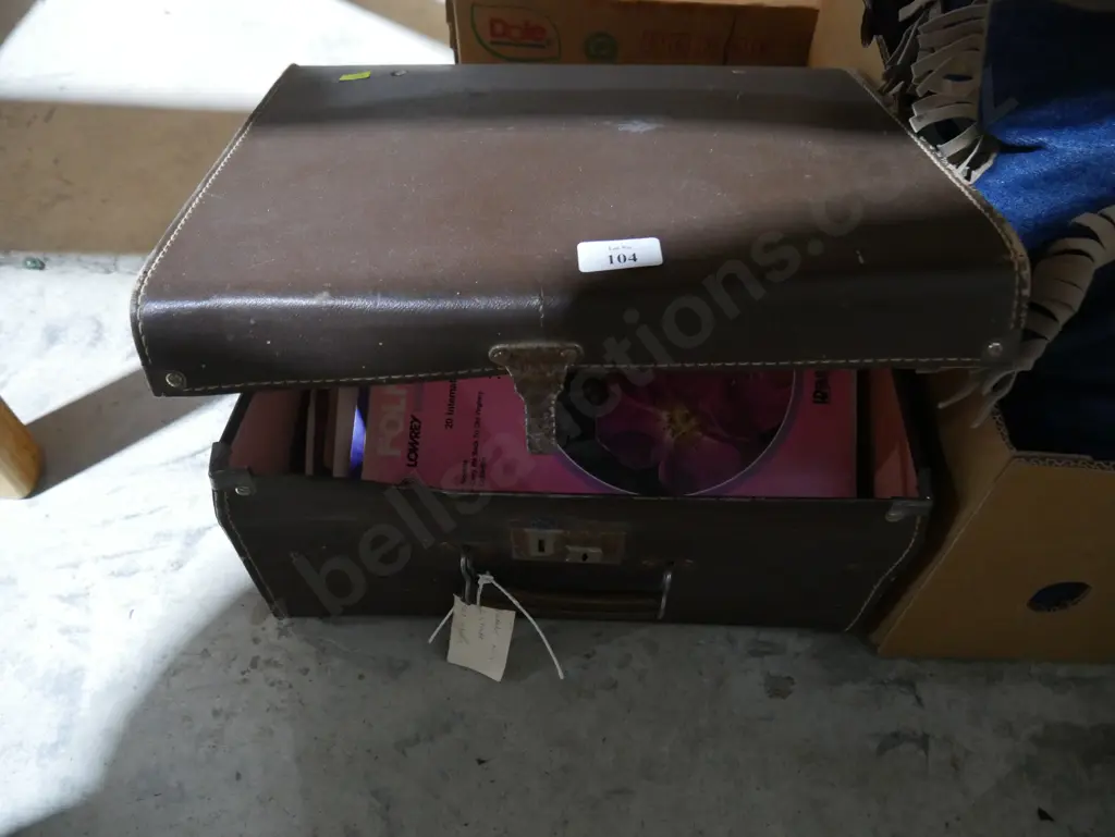 Suitcase and music books Image 1++