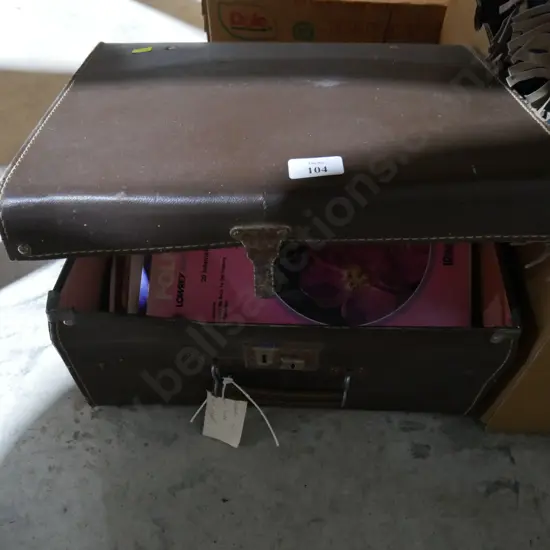 Suitcase and music books