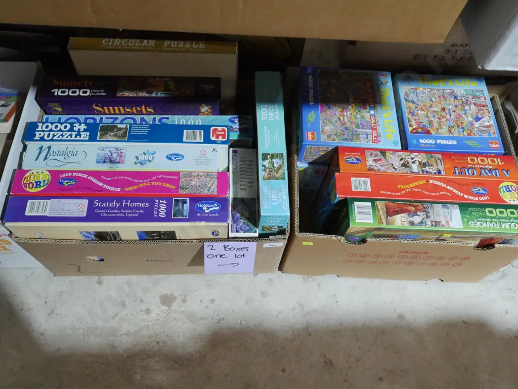 Two boxes of jigsaw puzzles Image 1++