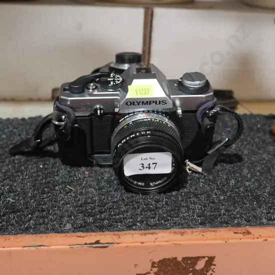 Olympus camera and lens