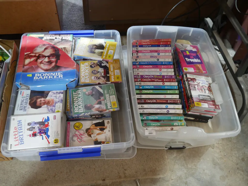 Two boxes of DVDs Image 1++