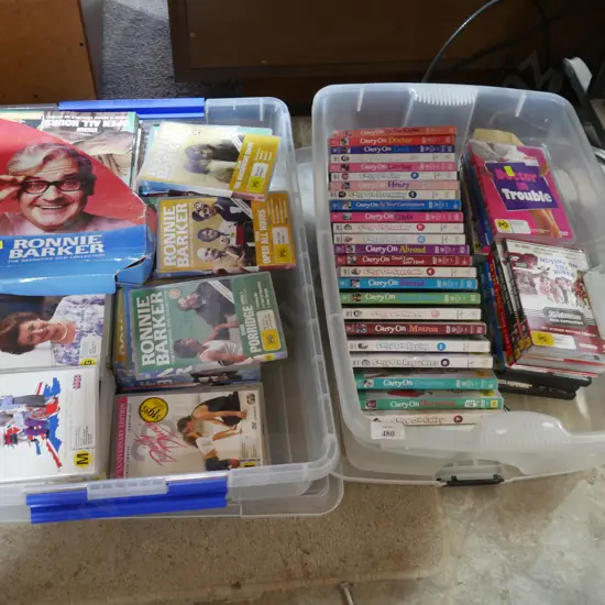 Two boxes of DVDs