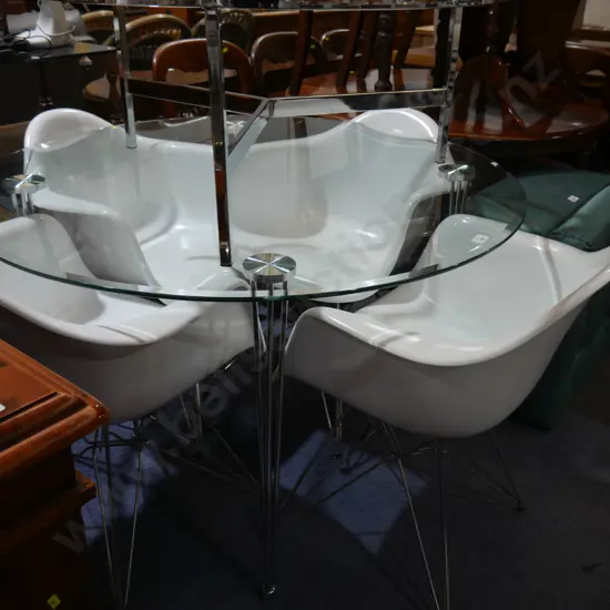 Glass top dining table and four chairs