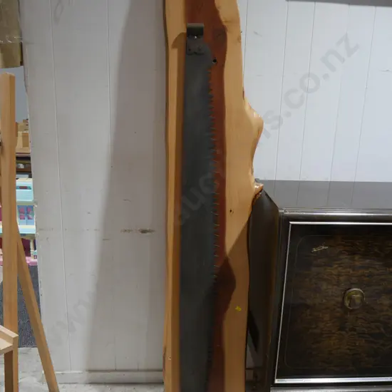 Pitsaw on wooden display