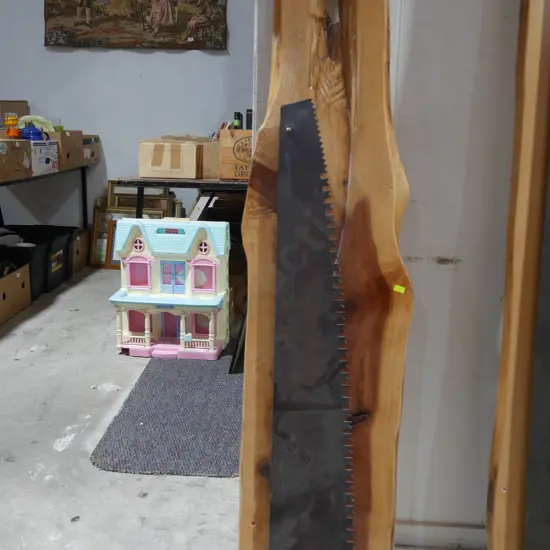 Pitsaw on wooden display