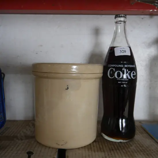 Pottery container , coke bottle