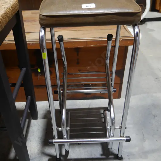 Stool with pullout footrest