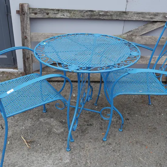 Wrought iron table and 2 chairs