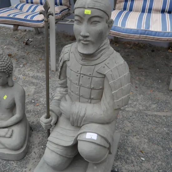 Oriental figure statue