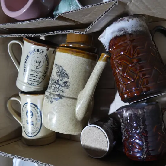 Pottery mugs , jugs