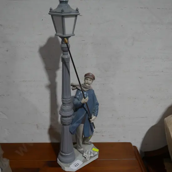 Lladro man and street lamp
