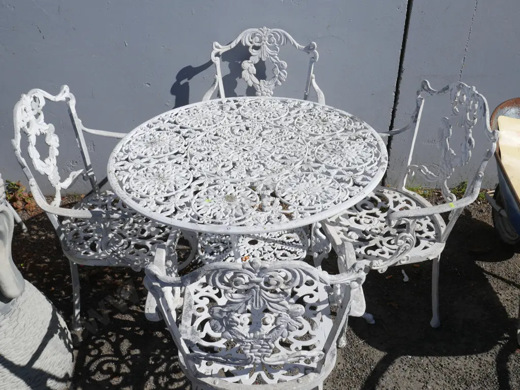 White wrought table and chairs Image 1++
