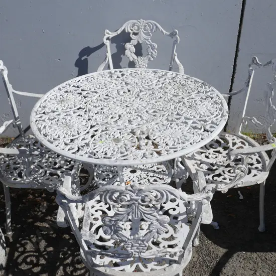 White wrought table and chairs