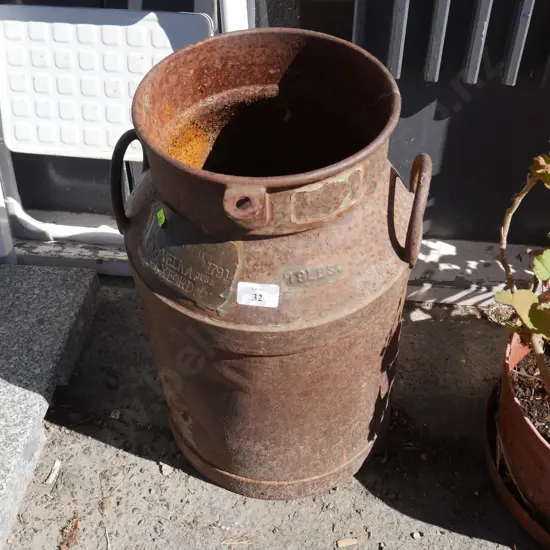 Vintage milk can - rusted base