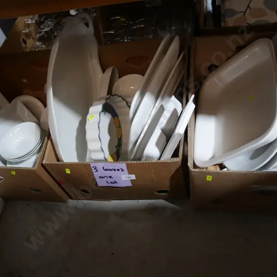 Three boxes of white dinnerware