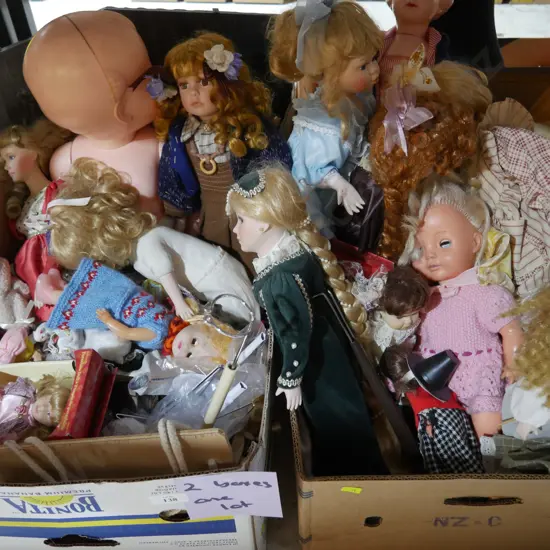 Two boxes of dolls