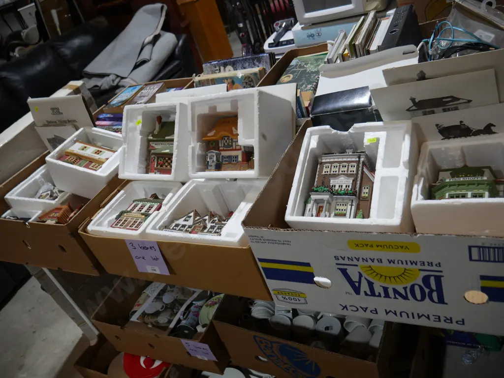 Three boxes of Dickens village series Image 1++