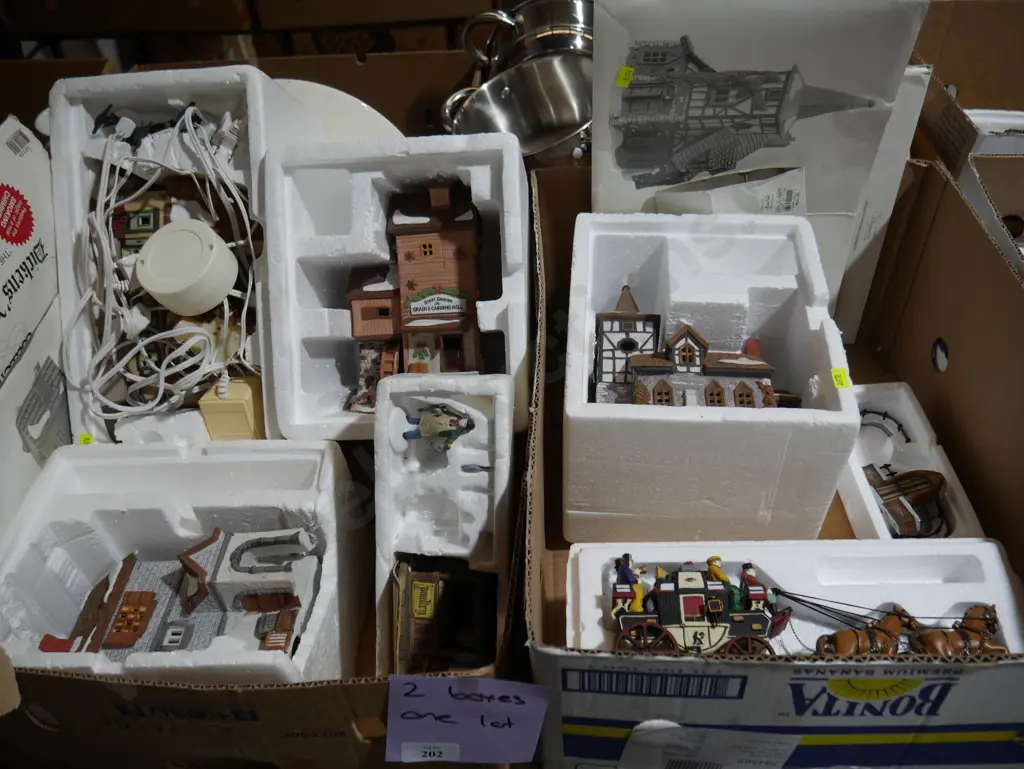 Two boxes of Dickens village series Image 1++