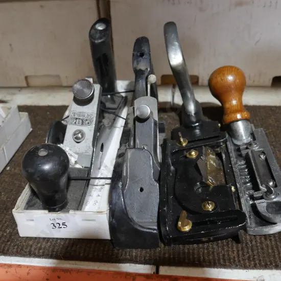 Four assorted wood planes