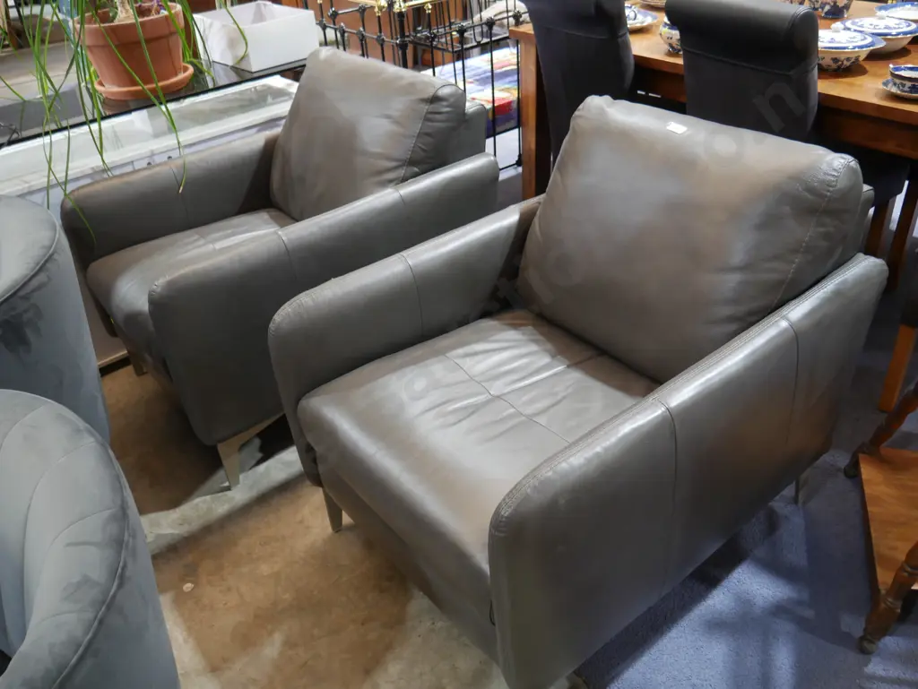 Pair of leather arm chairs Image 1++