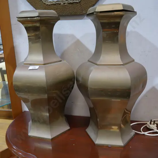 Two metal lidded urns