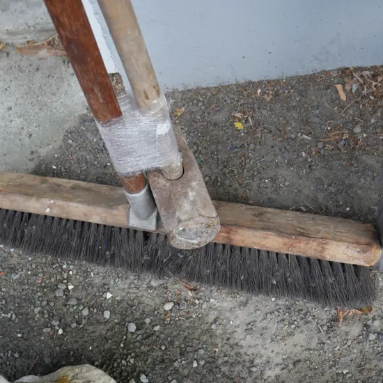 Sledge hammer and broom