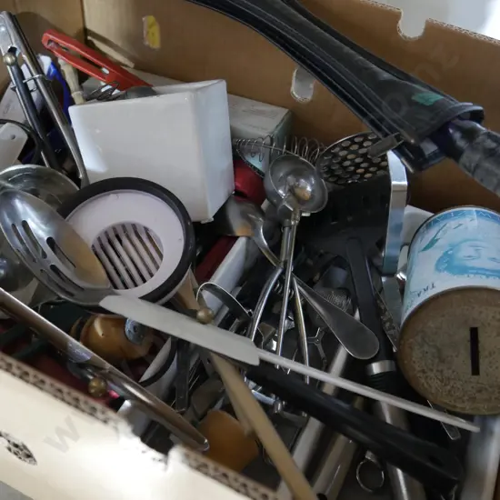 Box of kitchen utensils and box of bed sheets