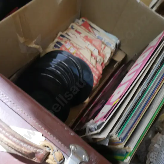 Records, leather suitcase