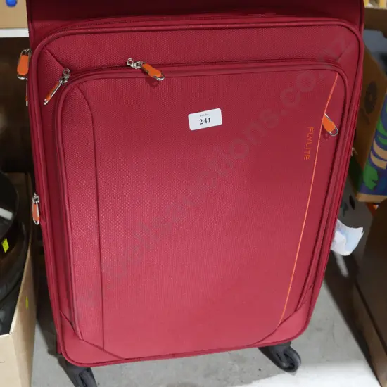 As new red suitcase