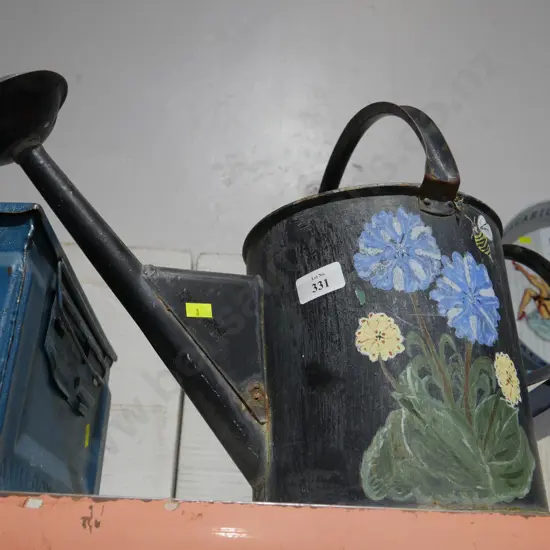 Painted watering can
