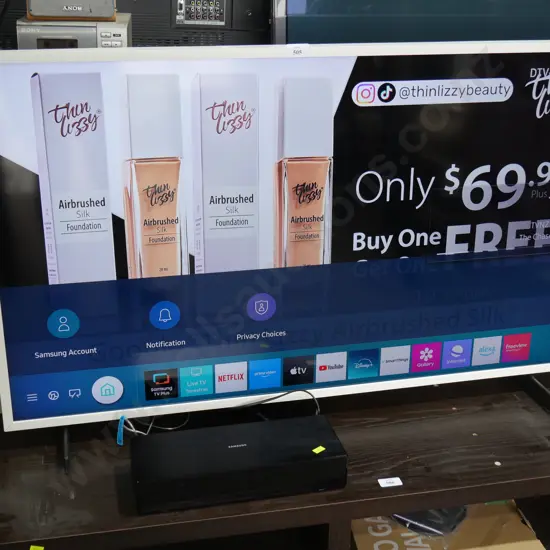 Samsung TV & black smart box