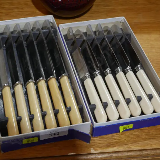 2 sets boxed bone handled knives