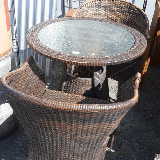 Cane glass top table and chairs