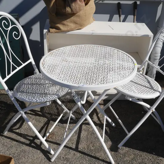 Wrought iron table and chairs