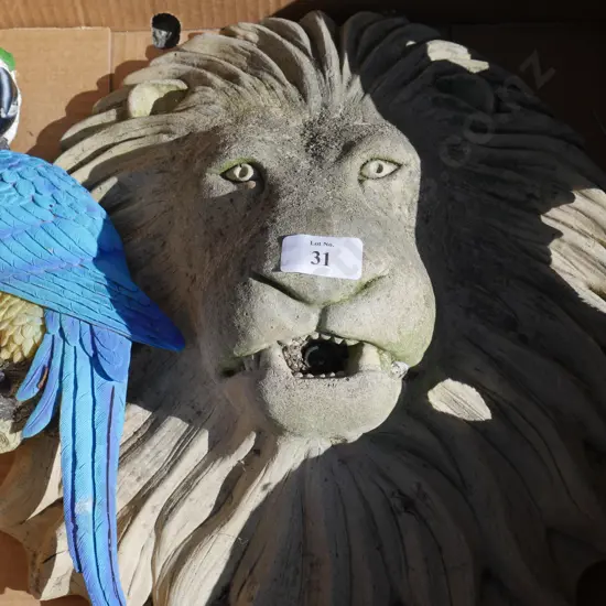Lion and parrot yard ornaments