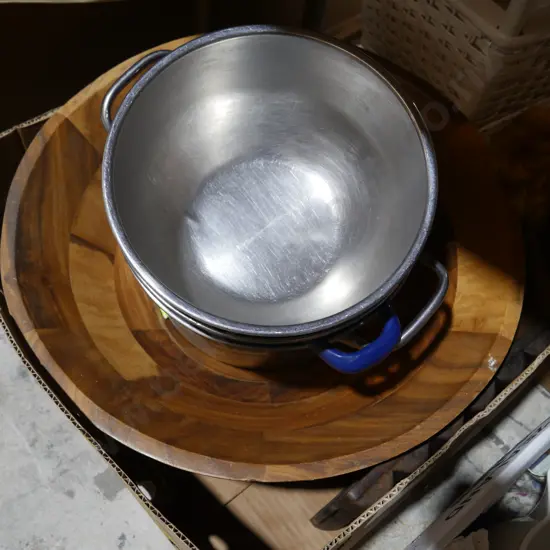 Stainless pots , wooden bowl